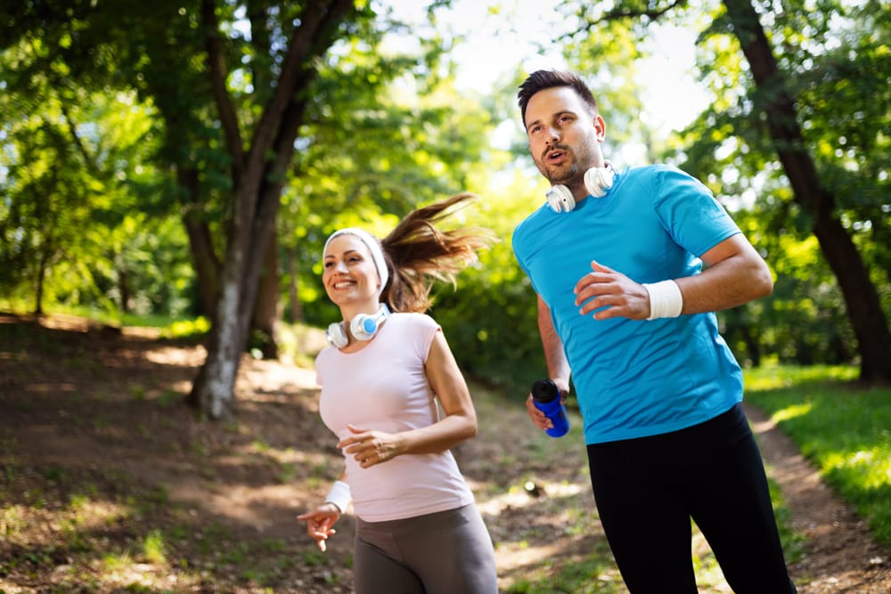 Happy,Couple,Running,And,Exercising,Together,Outdoor