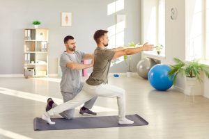 Man,Therapist,Is,Conducting,A,Sports,Rehabilitation,And,Physiotherapy,Session